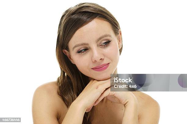 Headshot Of Beautiful Woman Looking Away Stock Photo - Download Image Now - 2015, 30-34 Years, 30-39 Years