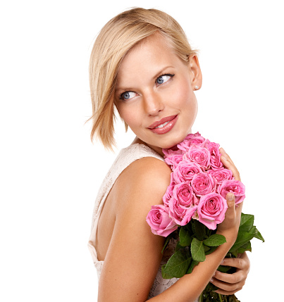 An attractive young woman with an arrangement of pink roseshttp://195.154.178.81/DATA/i_collage/pi/shoots/784927.jpg