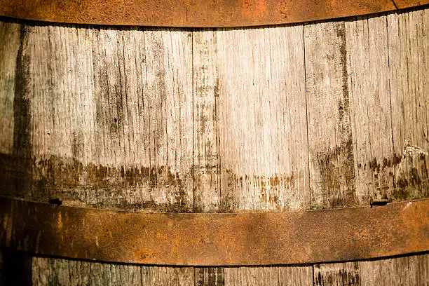 Photo of Backgrounds: Close-up of an old wooden whiskey barrel.