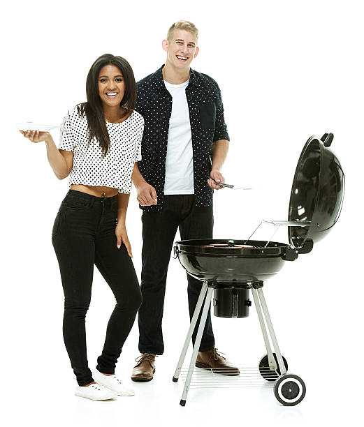 istock Couple together by the barbecue grill 466738562