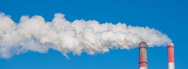 istock Smoking chimneys against the blue sky 466738940