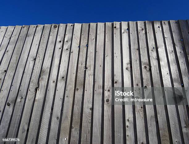 Image Of Wooden Featheredge Fence Treated Tanalised Timber Featheredge Fencing Stock Photo - Download Image Now