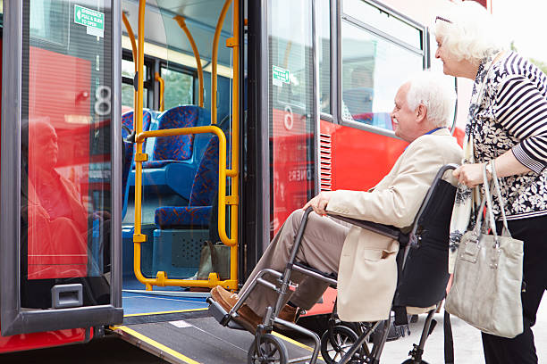 istock Senior Couple Boarding Bus Using Wheelchair Access Ramp 466740985