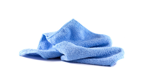 Lump blue towel on a white background