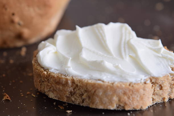 istock Slice of bread with cream cheese. 466742698