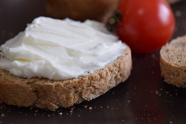 istock Slice of bread with cream cheese. 466743350