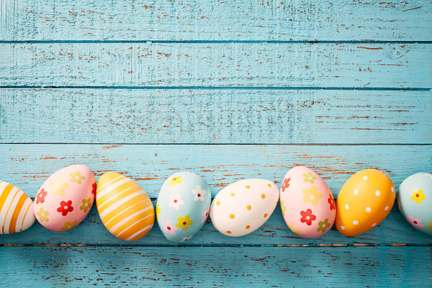 istock Easter Eggs on Old Blue Wood - Season Background 466743608