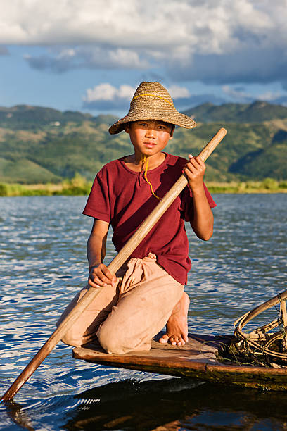 istock Young fisherman on Inle Lake, Myanmar 466744175