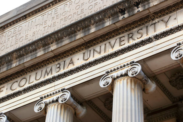 New York City, New York, USA - December 31, 2014: Columbia University inscribed on the Low Memorial Library facade at New York City's Columbia University 