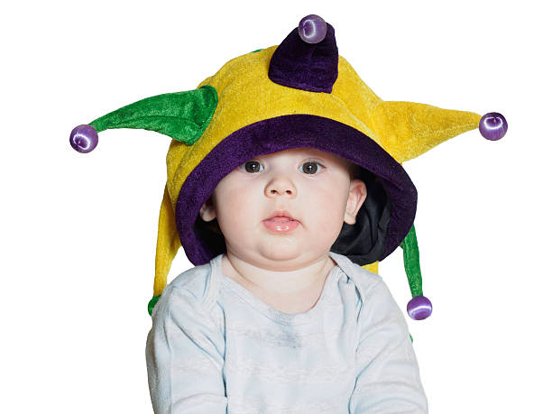 istock Caucasian baby boy wearing a colored party hat isolated 466745324
