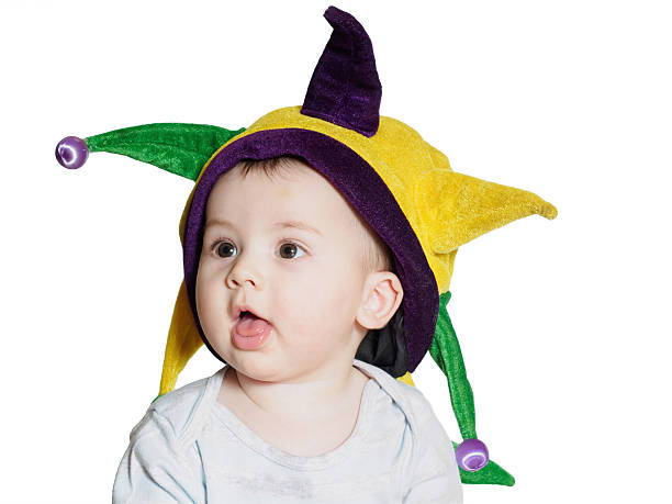 istock Caucasian baby boy wearing a colored party hat isolated 466745328