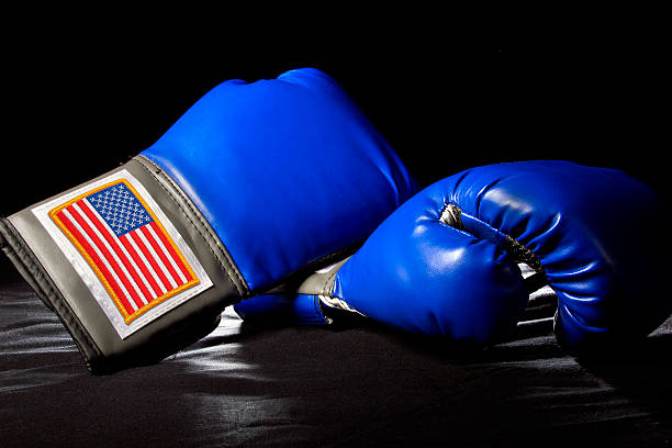 istock Blue American Boxing Gloves on a Black Background 466745664