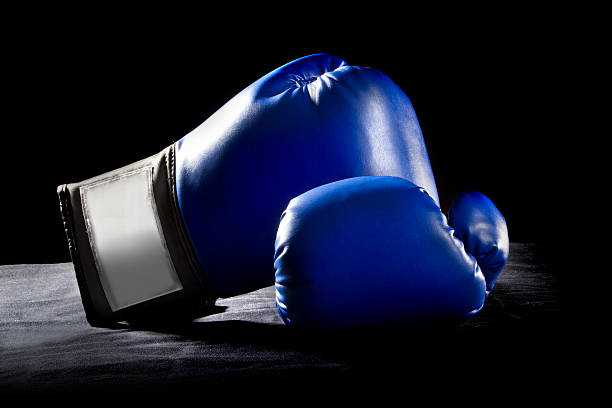 istock Blue Boxing Gloves on a Black Background 466745672