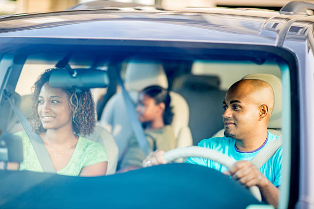 Family Roadtrip African American family on a roadtrip family-van-driving stock pictures, royalty-free photos & images