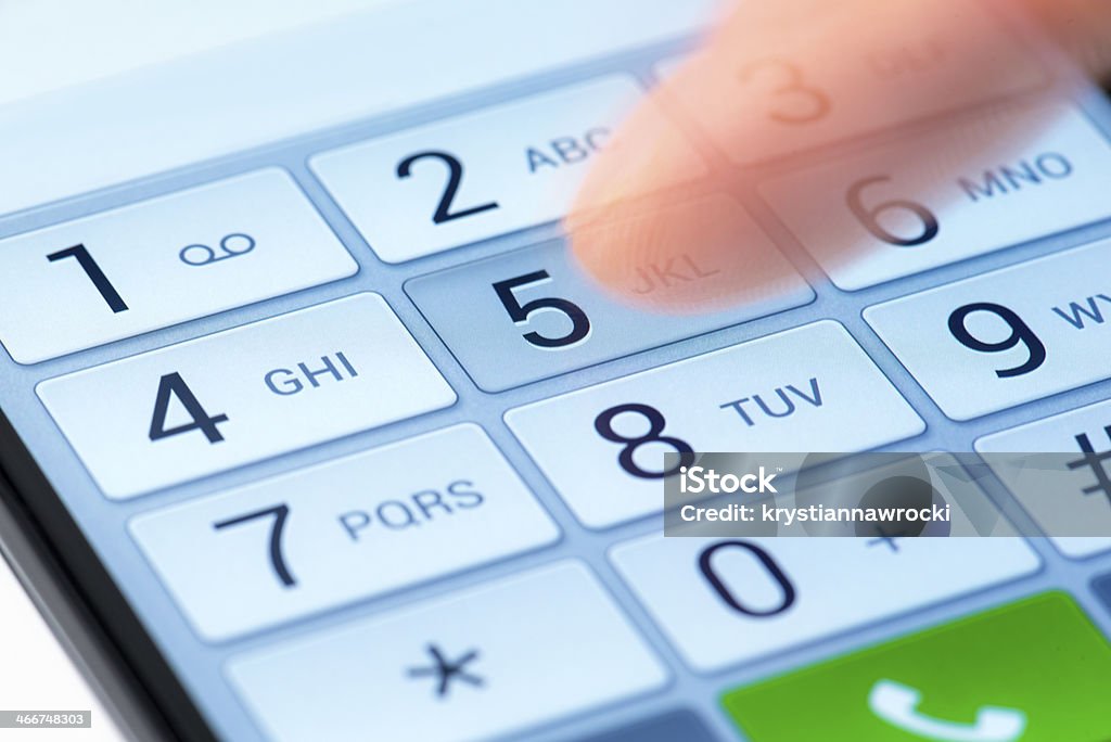 Dialing keyboard of a smart phone Dialing Blue Stock Photo