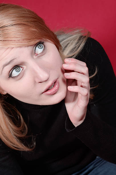 istock Surprised young woman photographed from above 466749145
