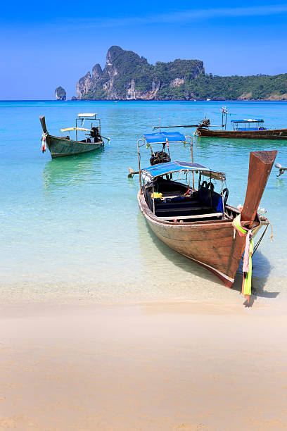 istock Thai longtail boats on PhiPhi Island 466749393