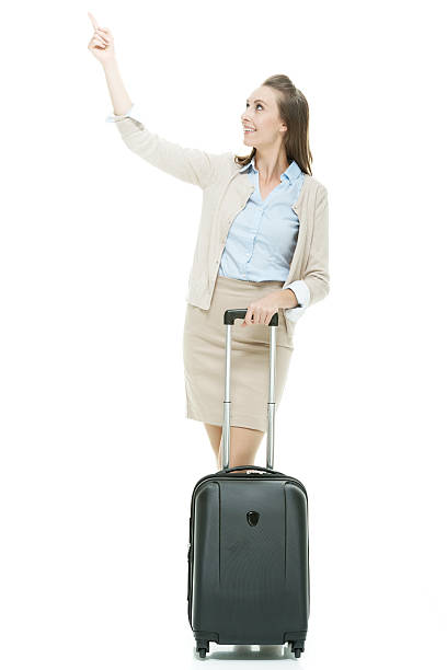 istock Happy businesswoman pointing away 466749558