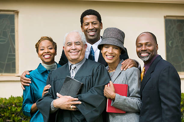 istock Smiling Family with Preacher 466753527