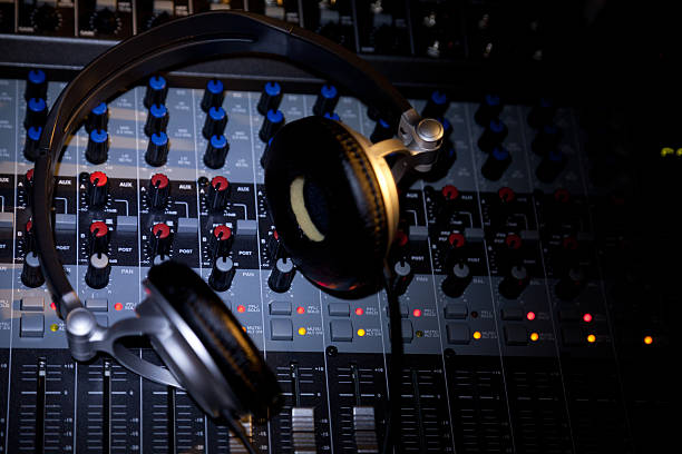 istock Headphones Over Audio Mixing Board 466754243