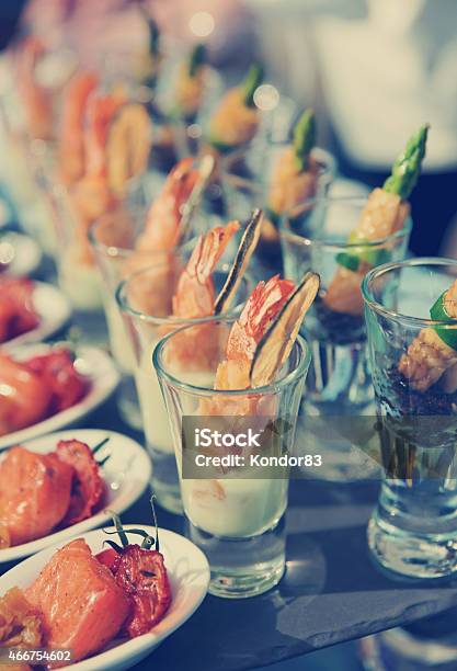 Glasses With Seafood Snacks Toned Image Stock Photo - Download Image Now - 2015, Arrangement, Asparagus