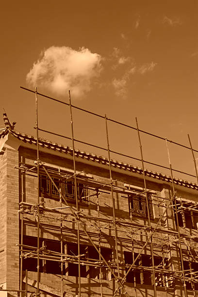 istock scaffolding and unfinished antique building 466754996