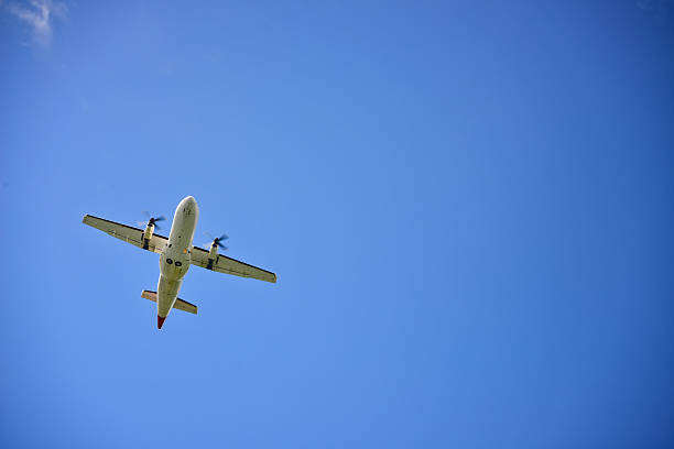 istock Propeller airplane flying in the sky 466755518