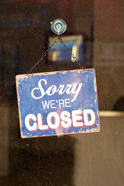 istock Sorry we're Closed old sign 466755602