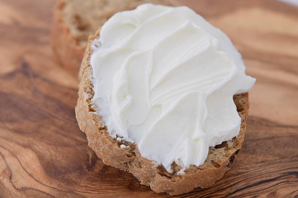 istock Slice of bread with cream cheese. 466756266