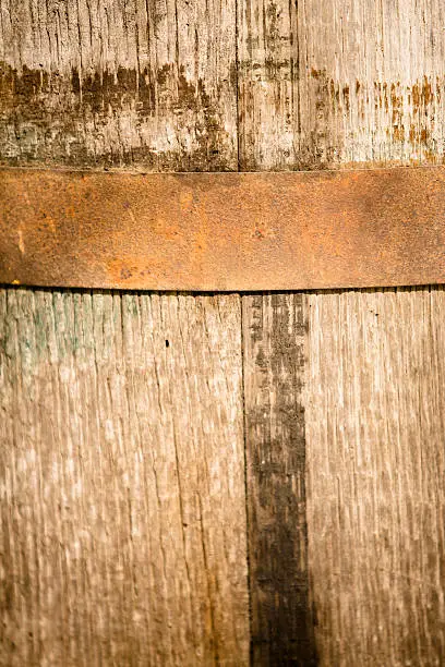 Photo of Backgrounds: Close-up of an old wooden whiskey barrel.