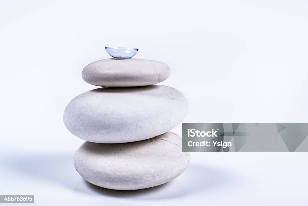 Contact Lens On A Pile Of White Stones Stock Photo - Download Image Now - Accessibility, Accuracy, Blue