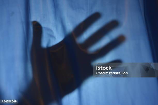 A Shadow Of A Hand On A Dark Shower Curtain Stock Photo - Download Image Now - Stop Gesture, Abstract, Anger