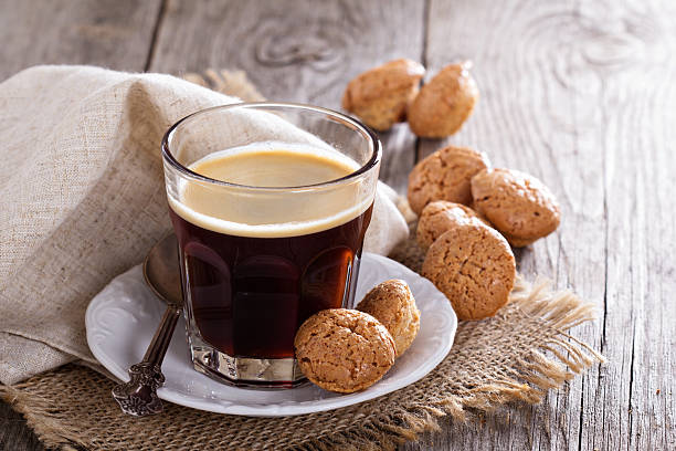 istock Black coffee in a glass with almond cookies 466765522