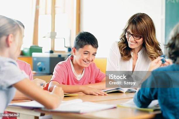 Teacher And Student On A Lesson Stock Photo - Download Image Now - 60-69 Years, Adolescence, Adult