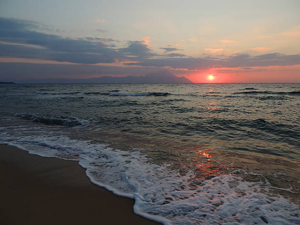 istock Sunrise On The Beach, Month Athos Across The Bay 466767236