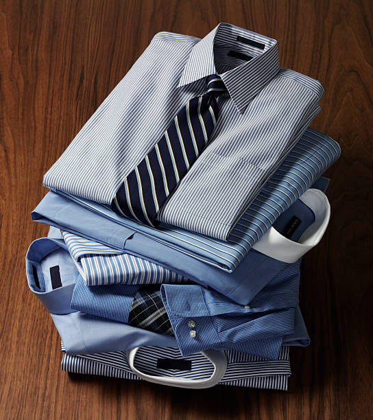 istock Stack of dress shirts with ties. 466771003