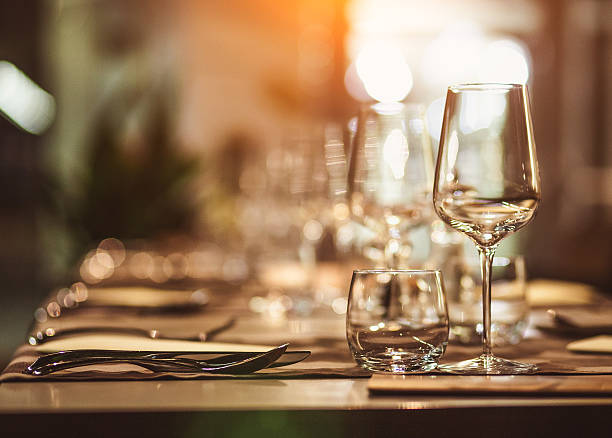 Table setting Table setting with wine glasses dining table stock pictures, royalty-free photos & images