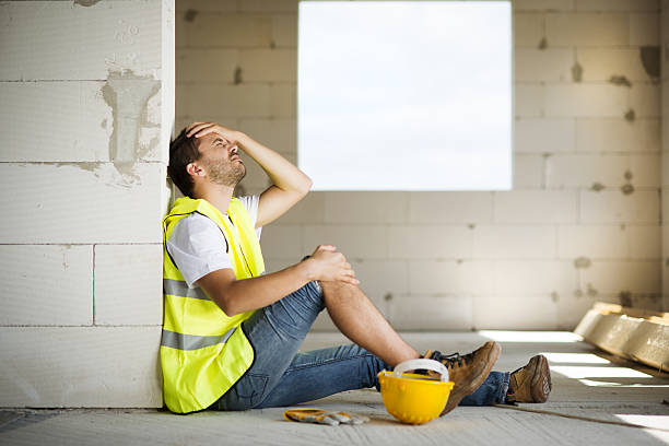 istock Male construction worker agonizes over accident at worksite 466774873