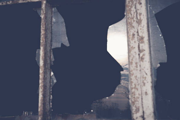 istock Broken glass at Window with mirror of sunlight 466775730