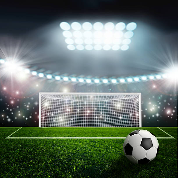 istock Soccer ball on green stadium arena 466776064