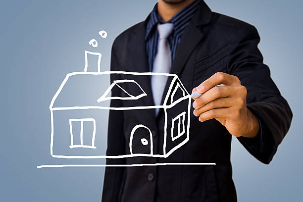 istock drawing home by businessman 466789437