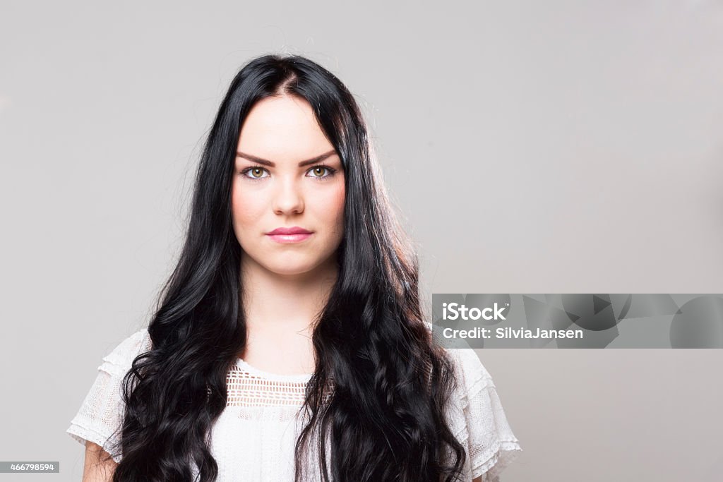 beautiful teenager Beautiful young woman with long black hair, smiling 18-19 Years Stock Photo