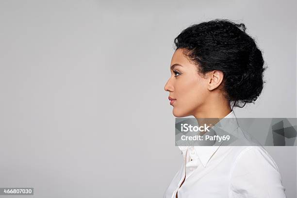 Closeup Profile Of Business Woman Looking Forward Stock Photo - Download Image Now - Profile View, Women, Side View