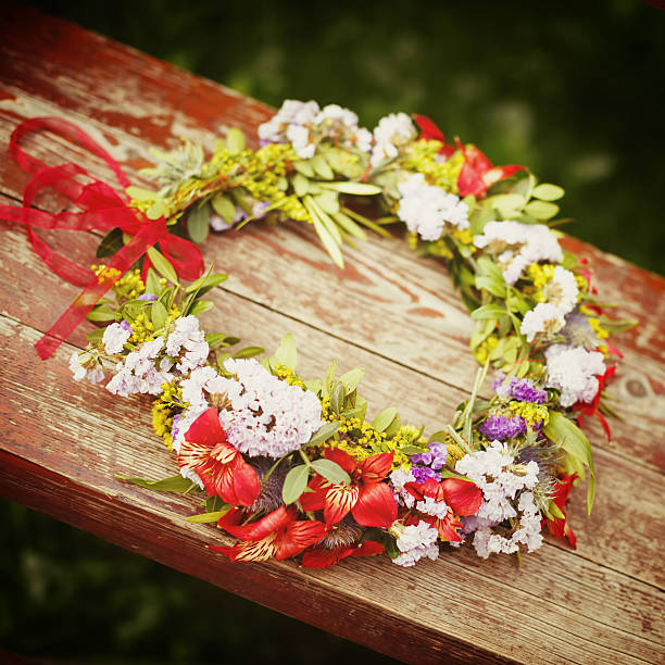 istock Flower wreath decoration on wood 466807224