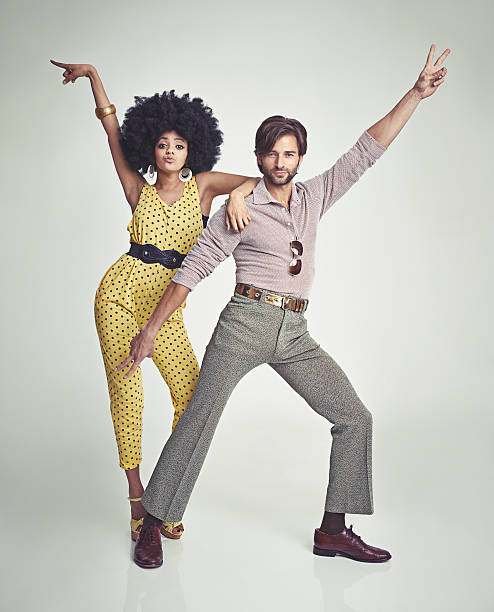 let's dance! - fashion men 1970s style hippie imagens e fotografias de stock