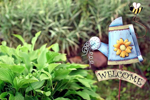 istock Decorative garden with Welcome Iron Signboard 466808536