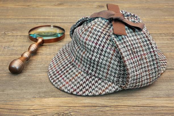 istock Deerstalker Hat and Retro Magnifying Glass 466815970