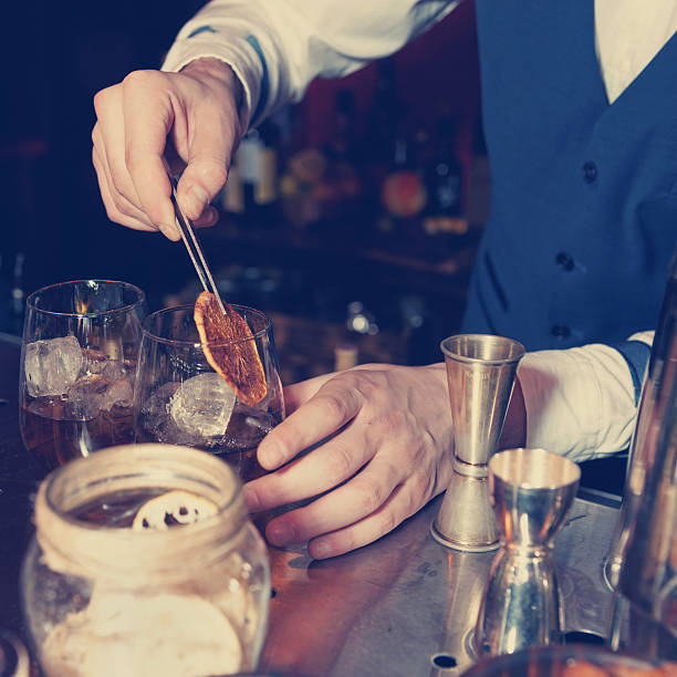 istock Barman works at bar counter, toned 466815992
