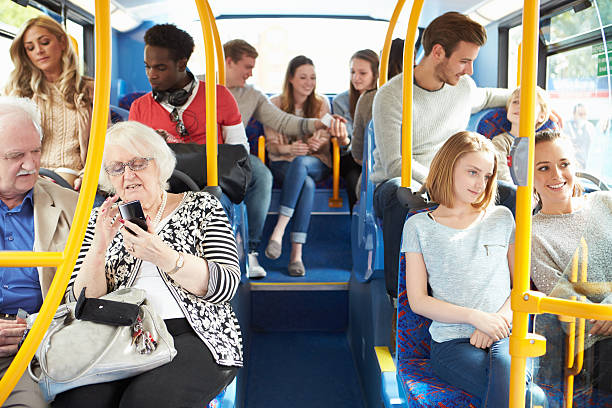 interno dell'autobus con passeggeri - bus transportation indoors people foto e immagini stock