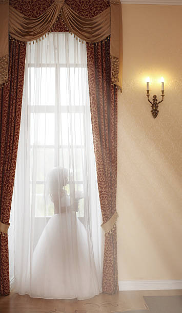istock Bride at the window at the wedding 466819016